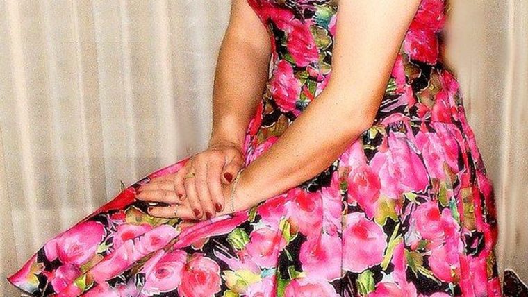 A lightweight vacation dress photographed outdoors in warm natural light