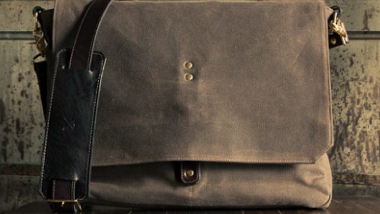 A compact neutral crossbody bag styled with a casual everyday outfit